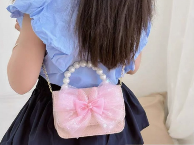 BORSA BAMBINA CON FIOCCO LATERALE E MINI ORSETTO